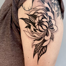 Custom Stylized Chrysanthemum Flower Blackwork Design tattooed by sheila.tattoos - Black Pearl Tattoo Santa Cruz CA