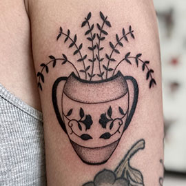 Flower Vase with delicate flowers, blackwork design by sheila.tattoos Black Pearl Tattoo Santa Cruz CA